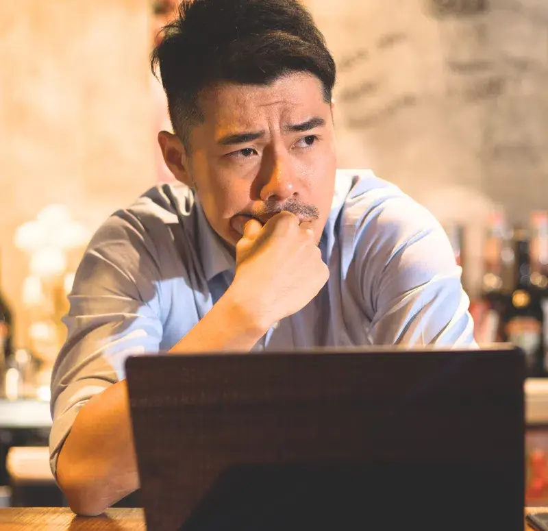 Stressed small business owner in his shop